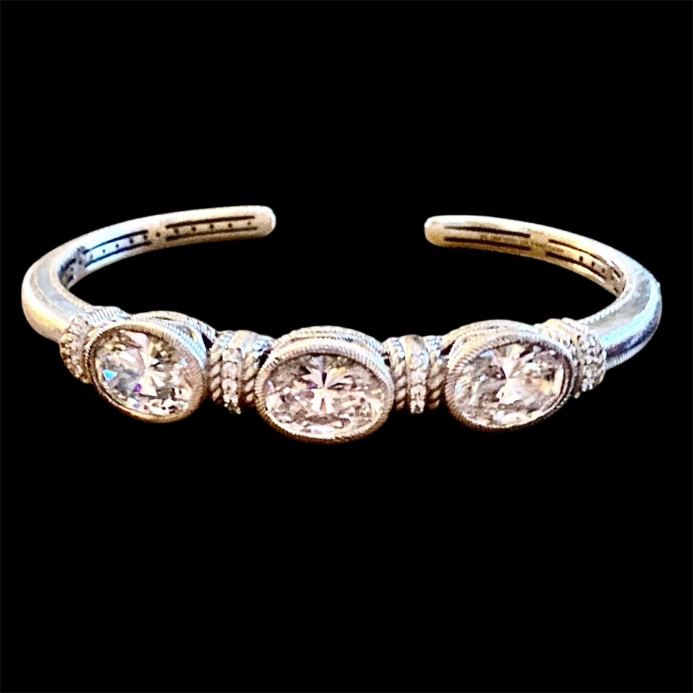 Judith Ripka, Sterling silver cuff and hinged bracelet with cz’s